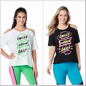 Zumba Wear Women’s Top  Cold Shoulder “ Smile Added Daily” White or Black